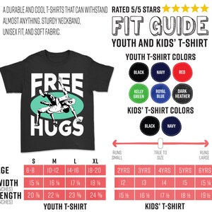 May include: A black t-shirt with a white graphic of two wrestlers with the text "FREE HUGS". The t-shirt is available in sizes S, M, L, and XL. A size chart is included for youth and kids' t-shirts, showing the width and length in inches for each size.