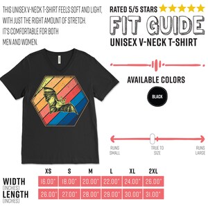 May include: Black unisex V-neck t-shirt featuring a bat design inside a retro-style hexagon. The shirt includes the text "THIS UNISEX V-NECK T-SHIRT FEELS SOFT AND LIGHT..." and size measurements in inches. Available in black.