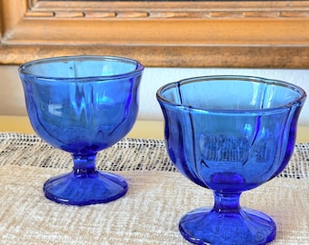 Pair of blue glass footed dessert bowls, likely Imperial Glass.