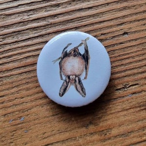 Fridge magnet/button bat
