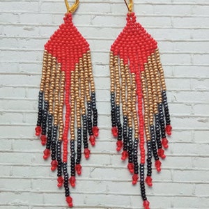 Red gold long earrings