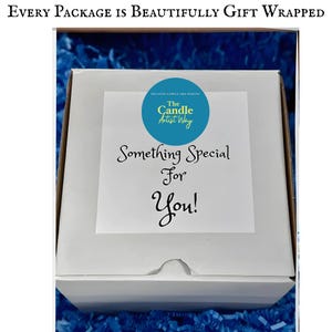 May include: A square white cardboard shipping box with a label featuring a blue circle logo that reads The Candle Artist Way and the text Something Special For You! The top of the image includes the text Every Package Is Beautifully Gift Wrapped.