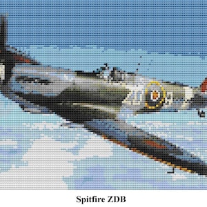 May include: A gray and green World War II era Spitfire fighter plane flies through a cloudy blue sky. The plane has a roundel on the side with the letters ZDB.