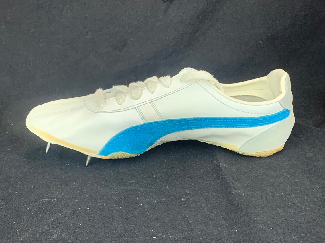 gold puma track spikes