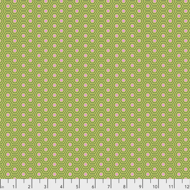 May include: A repeating pattern of green and pink hexagons. The hexagons are arranged in a diagonal pattern. The background is a light green colour.
