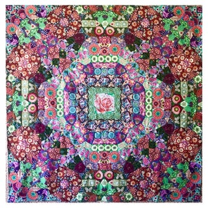 May include: A colorful quilt with a floral pattern. The quilt is made up of many different squares, each with a different floral design. The quilt is symmetrical and has a central square with a large rose in the middle.