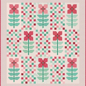May include: A handmade quilt featuring a floral pattern. The quilt showcases large, stylized flowers in shades of pink and red, with green stems and leaves. The background is a light cream color, and the quilt is bordered with a pink and white patterned fabric.