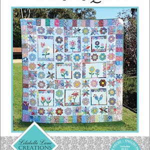 May include: A Seasons Quilt pattern by Lilabelle Lane Creations by Sharon Burgess. The cover features a multi-colored floral patchwork quilt with star and flower motifs, surrounded by a border of small fabric squares, with text and templates.