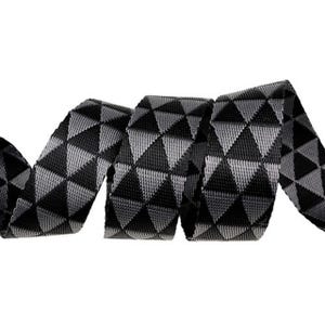 May include: Black and gray woven ribbon with a geometric triangle pattern.
