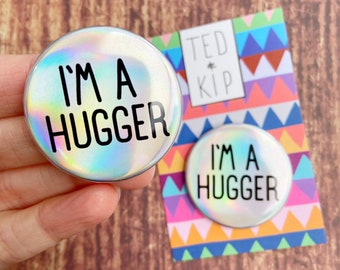 I’m A Hugger Badge- Rainbow Holo Button - Accessory Pin - Safe Awareness