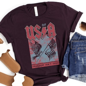 US of A — Freedom Isn&#39;t Free Unisex-Fit Band T-shirt