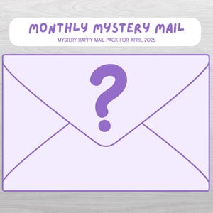 May include: A light purple envelope with a large question mark in the center. The text "MONTHLY MYSTERY MAIL" is above the envelope, and "MYSTERY HAPPY MAIL PACK FOR APRIL 2026" is below it. The envelope is on a light gray background.