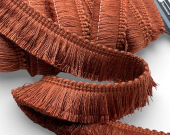 Frangia decorativa in viscosa color terracotta, larghezza 30 mm.