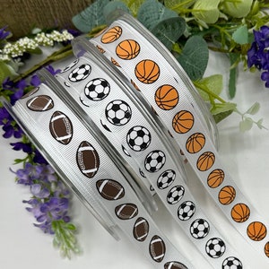 3/4" sportlint, wit geribbeld met keuze uit basketbal, rugby/American Football of voetbal, decoratie sportfeest