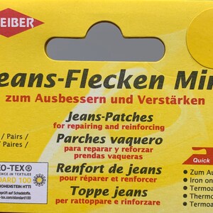 May include: A yellow package with a red and white logo that says "KLEIBER". The package contains 3 pairs of iron-on patches for repairing jeans. The text on the package says "Jeans-Flecken Mini zum Ausbessern und Verst&auml;rken" in German, "Jeans-Patches for repairing and reinforcing" in English, "Parches vaquero para reparar y reforzar prendas vaqueras" in Spanish, "Renfort de jeans pour r&eacute;parer et renforcer" in French, and "Toppe jeans per rattoppare e rinforzare" in Italian. The package also has a small iron icon with the word "Quick" next to it.