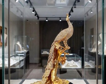 Braccialetto dorato a forma di uovo Fabergé con pavone, ornamento e gioiello a forma di uovo Fabergé, regalo per il 25° anniversario di compleanno per lei.