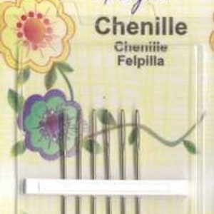 May include: A package of six chenille needles, size 26, by Mary Arden of England. The needles are silver and are packaged in a clear plastic sleeve with a white backing. The packaging features a floral design with the text "Chenille" and "Felpilla" in a decorative font.