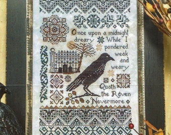 May include: A framed cross-stitch embroidery featuring a raven, a gothic-style building, and a quote from Edgar Allan Poe's poem "The Raven": "Once upon a midnight dreary, While I pondered, weak and weary, Quoth the Raven, Nevermore."