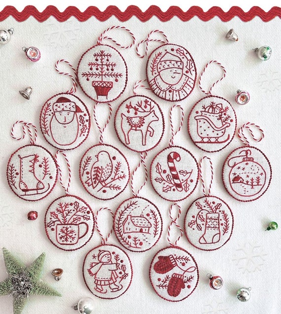 キャシー・シュミッツの刺繍パターンによる陽気で明るいレッド