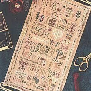 May include: A cross-stitch sampler with a beige background and colorful embroidery. The design features a variety of motifs, including houses, flowers, animals, and letters. The sampler is framed and displayed on a wall.