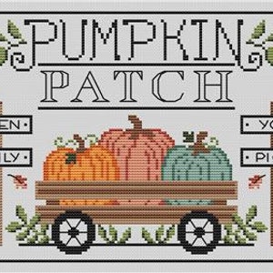 May include: Cross-stitch pattern of a pumpkin patch sign with the text "Pumpkin Patch" in black letters. The sign is decorated with floral accents and a wagon filled with pumpkins. The wagon has wooden wheels and is pulled by a wooden handle. The sign also includes the text "Open Daily" and "You Pick" on two smaller signs.
