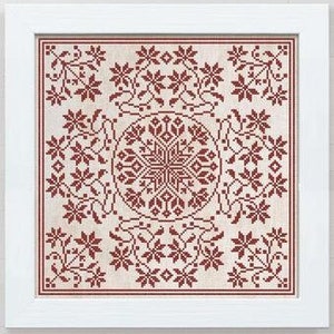 May include: A framed cross-stitch pattern with a red floral design on a white background. The design features a central snowflake motif surrounded by smaller floral elements.
