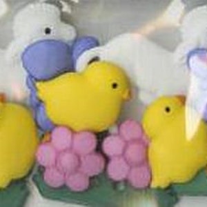 May include: Assortment of colorful plastic buttons featuring a chick, flower, and butterfly design. The buttons are perfect for crafting projects.