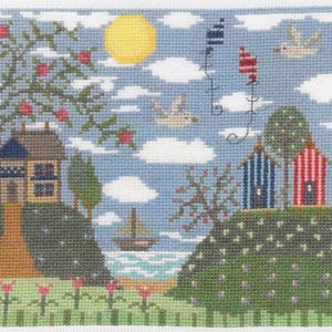 May include: Cross-stitch landscape featuring a sunny sky with clouds, birds, and a yellow sun. Two houses and a sailboat are visible. The scene includes trees, flowers, and decorative kites, creating a charming, pastoral scene.