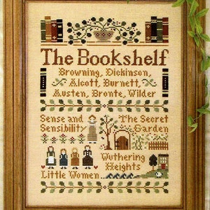 May include: Cross-stitch artwork in a wooden frame. The design features the text "The Bookshelf" and various book titles and authors. The artwork is in shades of brown, green, and beige, with floral and book motifs.