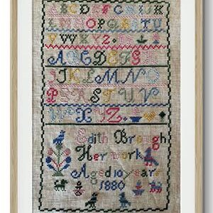 May include: A framed sampler with an alphabet embroidered in colorful thread. The sampler is signed "Edith Brough Her Work Aged 10 years 1880".