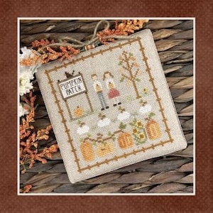 May include: Cross-stitch embroidery of a fall scene with a sign that reads "Pumpkin Patch", two figures holding pumpkins, a tree, pumpkins, sunflowers, and birds.
