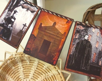 May include: A Halloween banner with three panels. The first panel shows a graveyard with a couple standing in the foreground. The second panel shows a stone mausoleum with a dark orange background. The third panel shows a man in a black cloak standing in front of a stone building with a dark orange background.