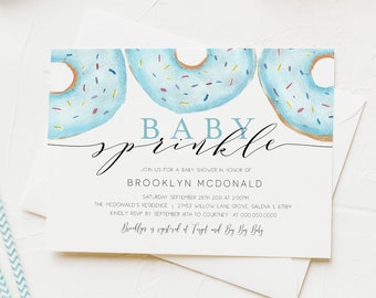May include: A baby shower invitation with a blue and white donut design. The text reads "Baby Sprinkle" and includes the date, time, and location of the event.