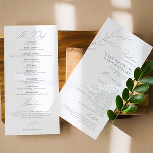 May include: A wedding ceremony program with a simple, elegant design. The program lists the officiant, bridal party, and wedding ceremony order. The program also includes a thank you message from the couple.