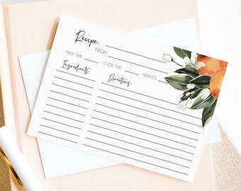 Könnte beinhalten: Eine druckbare Rezeptkarte mit einem floralen Design mit Orangenblüten und Früchten. Die Karte hat Zeilen zum Aufschreiben des Rezeptnamens, der Vorbereitungszeit, der Garzeit, der Portionen, der Zutaten und der Anweisungen.