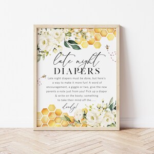 May include: A printable sign with a watercolour background of white flowers and a honeycomb pattern. The text reads "late night diapers" and includes a short poem about giving new parents a little encouragement.