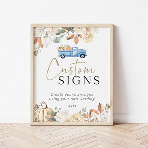 May include: A framed printable sign with a watercolor illustration of a blue truck carrying pumpkins, fall leaves, and flowers. The sign says "Custom Signs" and "Create your own signs using your own wording 8x10".