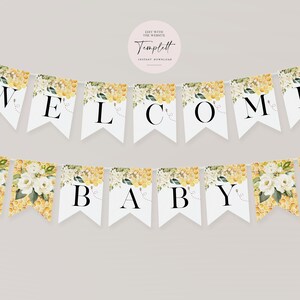 May include: A white banner with the words "Welcome Baby" in black letters. The banner is decorated with a honeycomb pattern, white flowers, and green leaves.