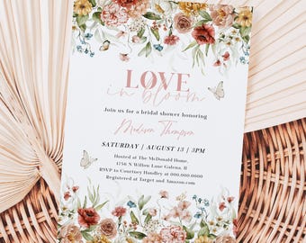 May include: A bridal shower invitation with floral accents and the words "LOVE in BLOOM." The invitation includes details such as the date, time, and location. The design features a soft color palette with butterflies.