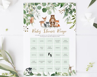 May include: A green and gold baby shower bingo card with woodland animal illustrations. The card has a grid of 25 squares with various baby items listed in each square. The text at the top reads "Baby Shower Bingo".