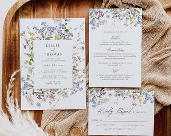 May include: A wedding invitation suite with a floral design. The invitation card features a watercolor illustration of blue and purple wildflowers. The RSVP card has a floral border and the text "Kindly Respond by May 28th".