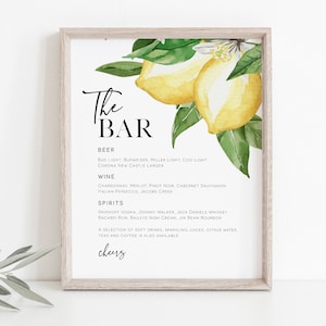 May include: A printable sign with a watercolor illustration of lemons and green leaves. The sign reads "The Bar" and lists a variety of beer, wine, and spirits. The text at the bottom reads "cheers".