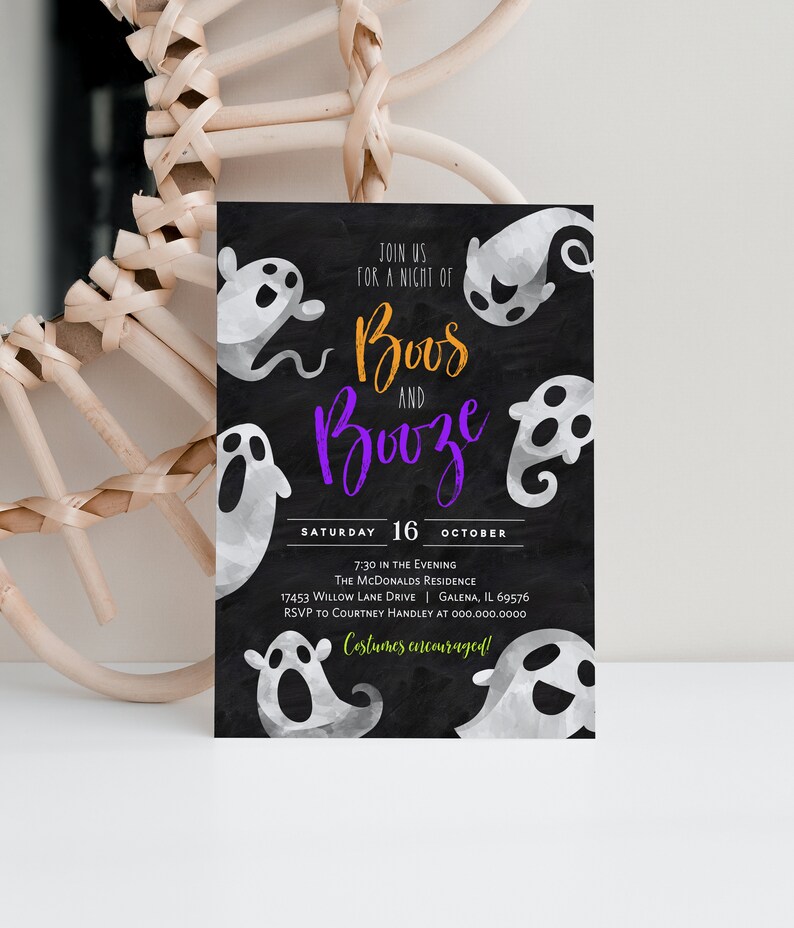 May include: A black and white Halloween party invitation with a chalkboard background. The invitation features the text "Booze and Boos" in purple and orange lettering. The invitation also includes the date and time of the party, the address, and the RSVP information. The invitation is decorated with white ghost illustrations.