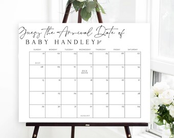 May include: A white sign with black text that says "Guess the Arrival Date of Baby Handley" with a heart symbol. The sign has a calendar grid with the months of July and August. The due date is marked on the calendar.