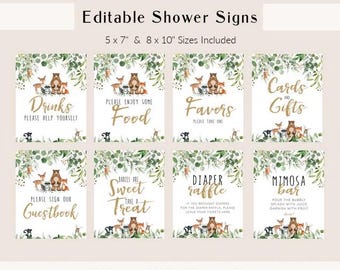 May include: A set of eight printable baby shower signs with woodland animal illustrations and gold text on a white background. The signs include phrases like "Drinks," "Favors," and "Guestbook." The text "Editable Shower Signs" is at the top.