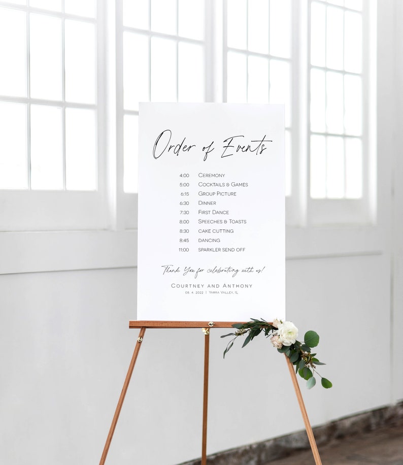 May include: A white sign with black text listing the order of events for a wedding. The sign includes the time and event, such as ceremony, cocktails and games, group picture, dinner, first dance, speeches and toasts, cake cutting, dancing, and sparkler send off. The sign also includes the names Courtney and Anthony and the date 06.4.2020.