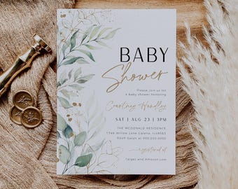 May include: A white baby shower invitation with a watercolor illustration of green leaves and gold accents. The text reads "BABY SHOWER" in black and "Please join us for a baby shower honoring Courtney Handley" in gold. The date and time of the shower are listed as "SAT I AUG 23 I 3PM". The location is "THE MCDONALD RESIDENCE 1746 Willow Lane Galena, IL 61036". The RSVP information is "RSVP Sarah at 000.000.0000". The bottom of the invitation reads "geted it Target and Amazon.com".