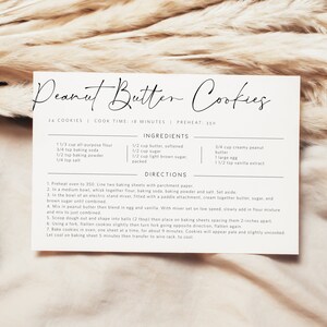 May include: A printable recipe card for peanut butter cookies. The recipe card is white with black text and includes a list of ingredients and directions for making the cookies. The recipe makes 24 cookies and has a cook time of 18 minutes. The oven temperature is 350 degrees Fahrenheit.