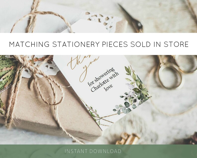 May include: A wrapped gift with a tag that reads "Thank you for showering Charlotte with love." The tag is decorated with green foliage and gold accents. The text "Matching Stationery Pieces Sold in Store" is at the top.