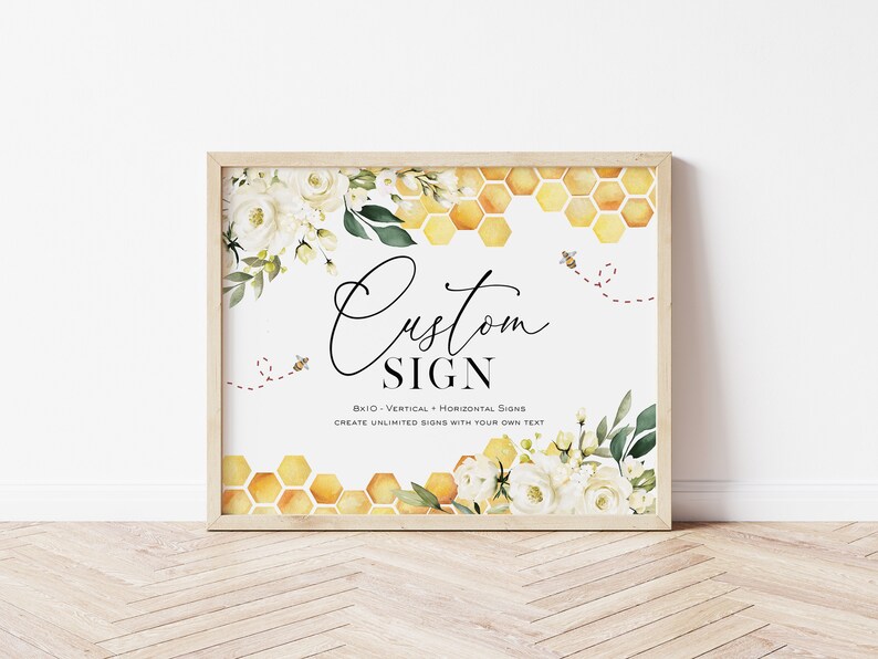 K&ouml;nnte beinhalten: Ein druckbares Schild mit einem Aquarell-Blumendesign mit wei&szlig;en Rosen und gr&uuml;nen Bl&auml;ttern. Der Hintergrund ist ein Wabenmuster in Gelb und Gold. Der Text auf dem Schild lautet "Custom Sign 8x10 - Vertical + Horizontal Signs Create Unlimited Signs with Your Own Text".